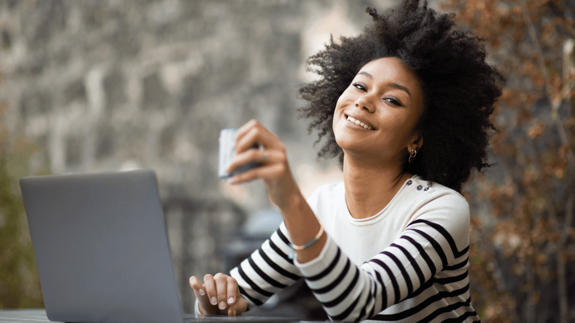 Person smiling during an online therapy session