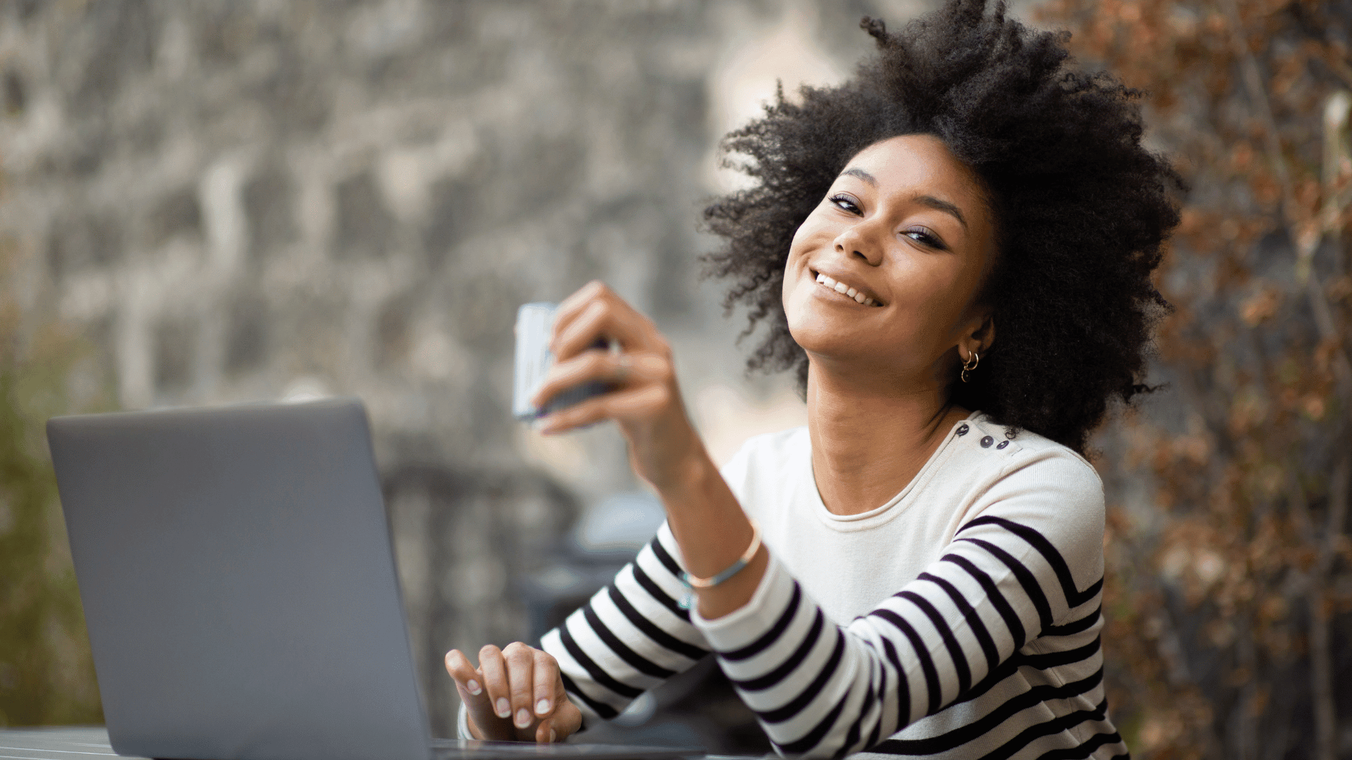 Best online therapy session with a woman smiling during individual therapy on her laptop